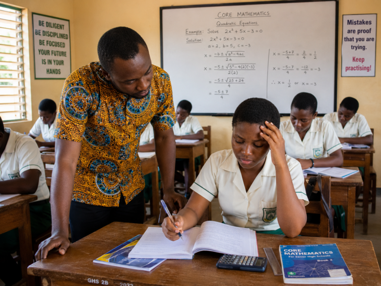 Ghanaian SHS teacher noticing weak mathematics students during a WASSCE Core Mathematics lesson